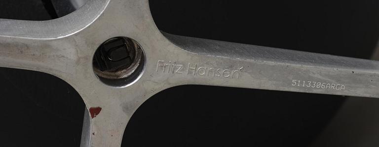 An Arne Jacobsen black leather 'Egg' chair, Fritz Hansen, Denmark 2007.