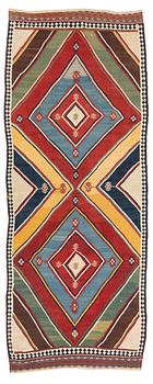 284. An antique Qashqai kilim rug, c. 380 x 148 cm.
