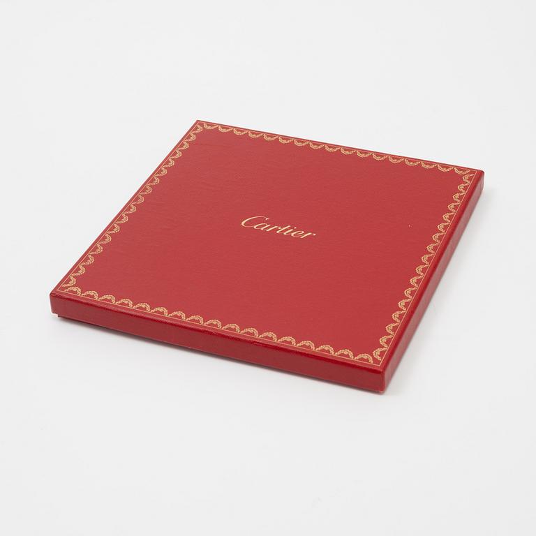 Cartier, a jacquard silk scarf.