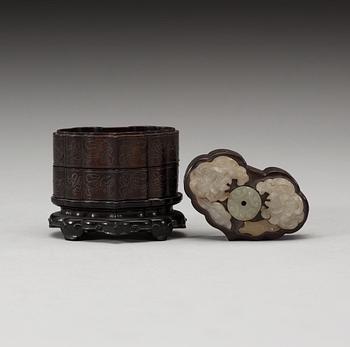 A three tiered wooden silver-inlayed box with cover, Qing dynasty.