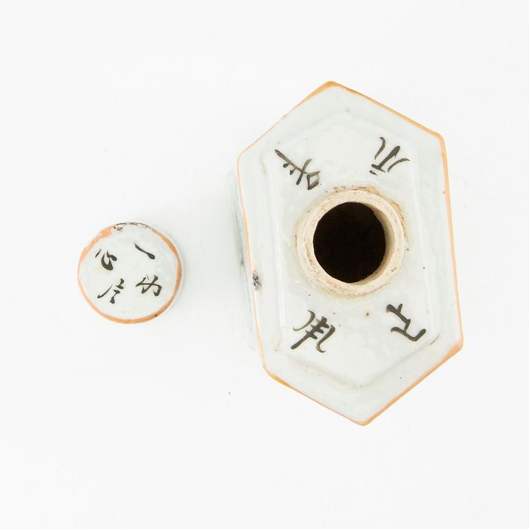 A set of two Chinese tea pots and a tea caddy, early 20th century.