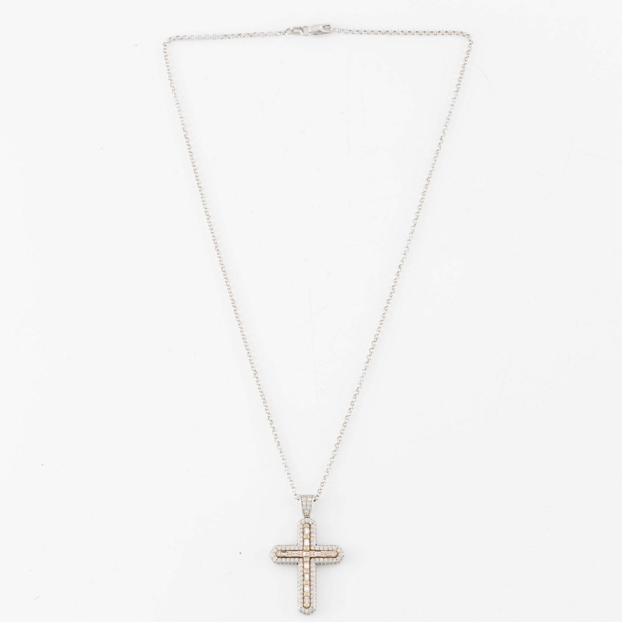 Necklace, 18K white gold in the form of a cross, set with baguette and brilliant-cut diamonds.