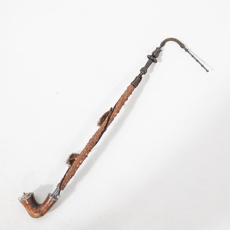 Long pipe  Carved wood with a silver mount Hasa Malmö 1986.