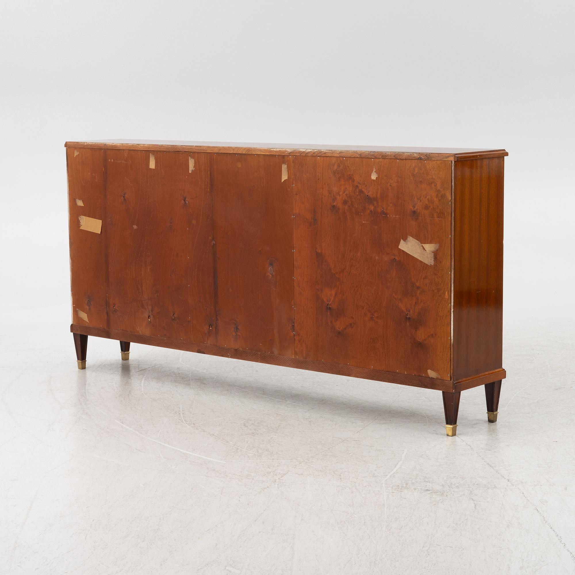 A bookcase, mid 20th century.