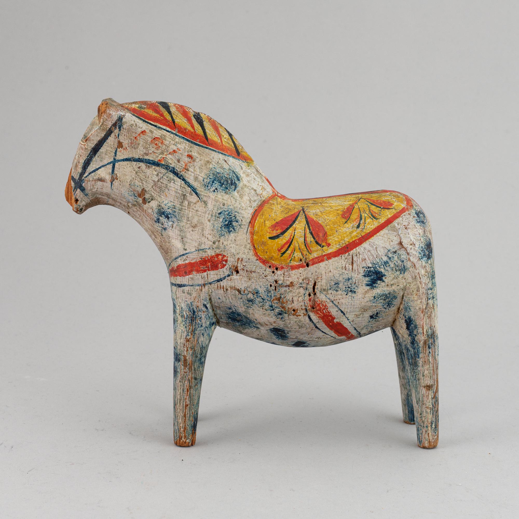 A wooden carved and painted 'Dalahäst', early 20th century.