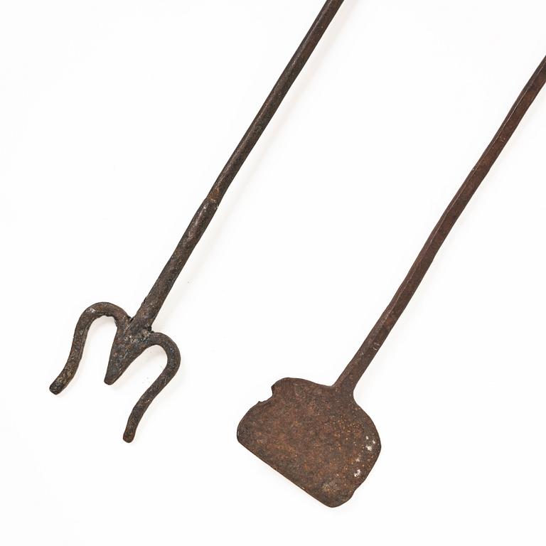 A set of two wrought iron fire pokers, 18th / 19th centiry.