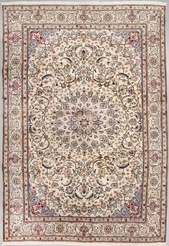 A CARPET, Nain, part silk, around 340 x 241 cm.