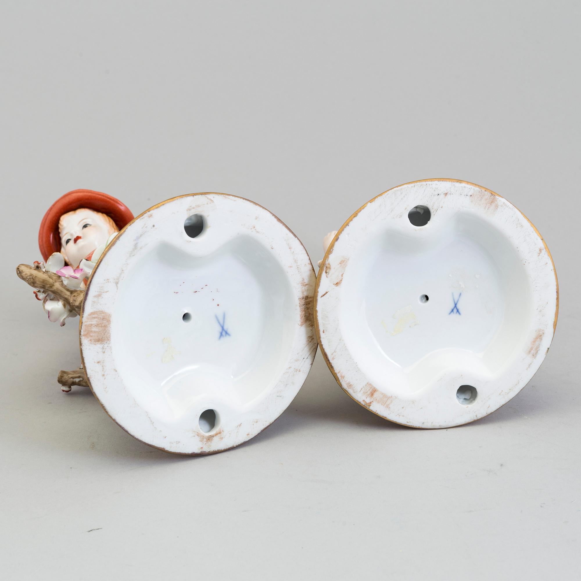a pair of porcelain figurines marked similar to meissen, 20th century.