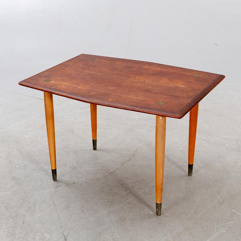 A mid 1900s teak coffee table from Tingströms möbler.
