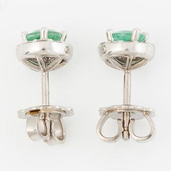 Earrings 14K white gold with emeralds and brilliant-cut diamonds.