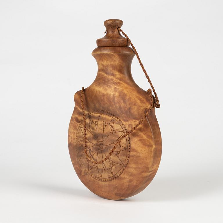 A birch flask by Erik Svonni, signed and dated 1975.