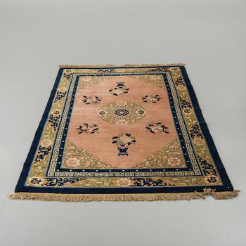 An old Chinese carpet ca 200 x 132 cm.