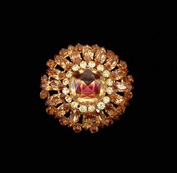 557. A brooch by Christian Dior.