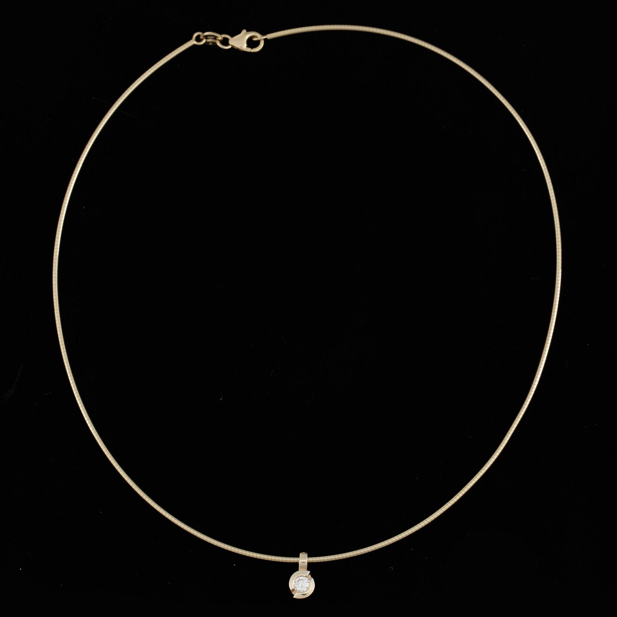 COLLIER, 18k guld med briljantslipad diamant ca 0,35 ct. Vikt ca 8,7 gram.