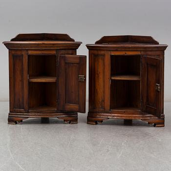 Two 19th century corner cabinets.