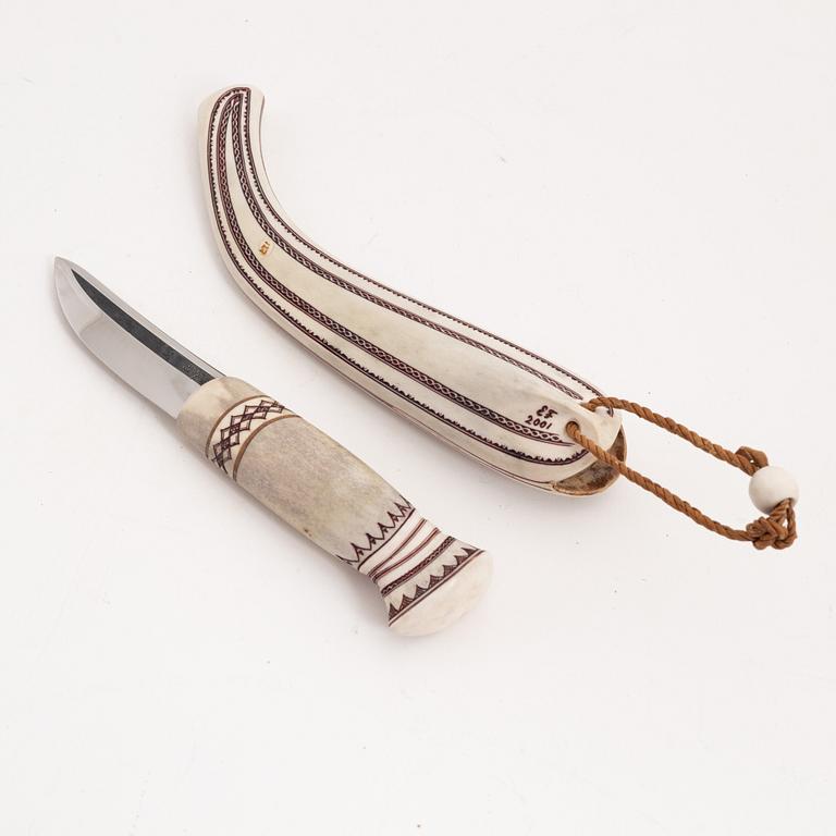 A reindeer horn knife by Erik Fankki, signed and dated 2001.