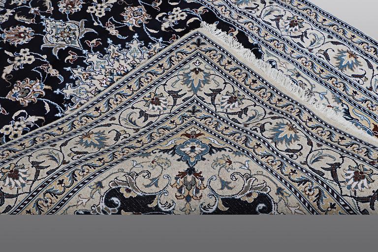A carpet, Nain, part silk, ca 212 x 153 cm.