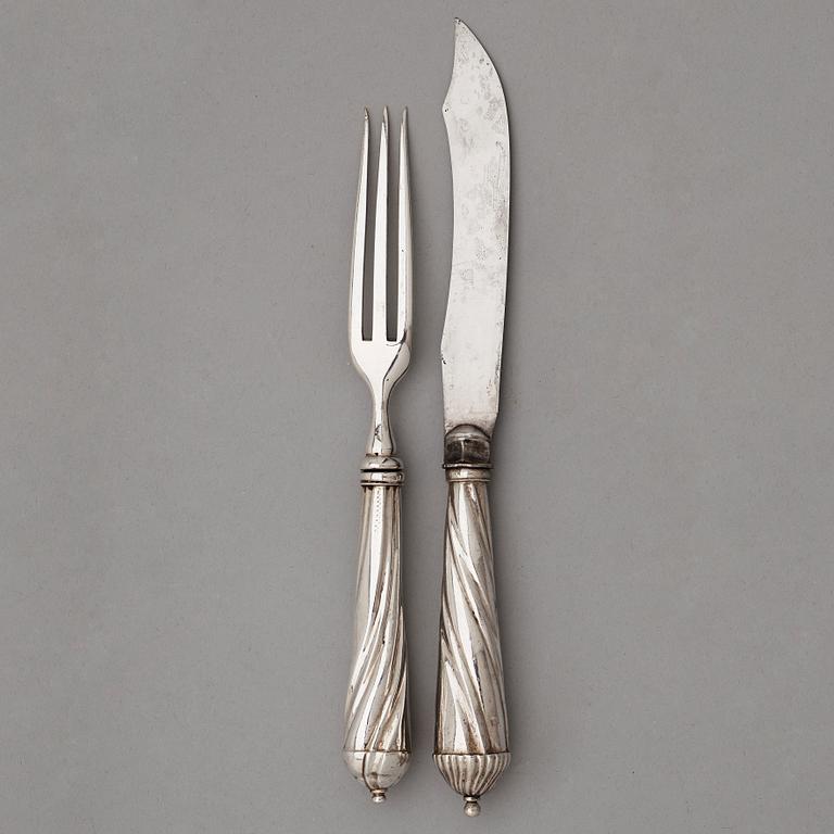 A set of twenty 18th century silver knifes and forks, unidentified marks.