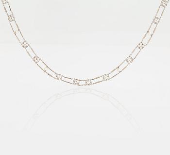 A NECKLACE with round brilliant-cut diamonds and pearls.