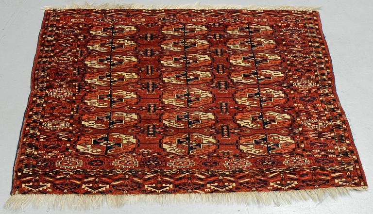 A rug, Antique Tekke, ca 115 x 115 cm.