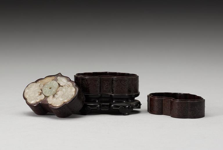 A three tiered wooden silver-inlayed box with cover, Qing dynasty.