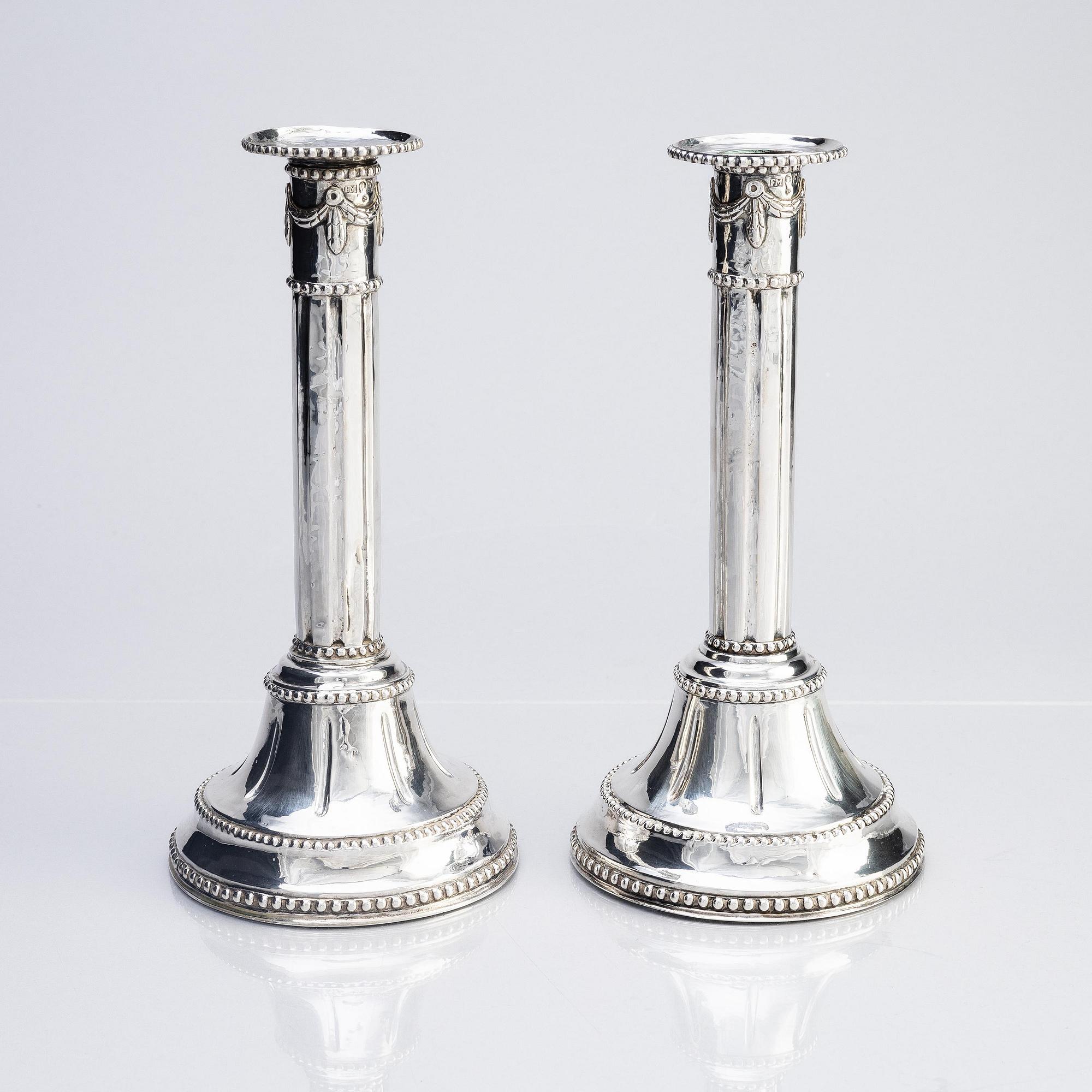 A pair of Swedish 18th century silver candlesticks, marks of Fredric Meyer, Karlshamn 1787.