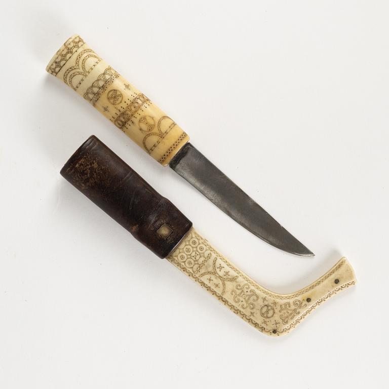 A reindeer horn knife dated 1916.