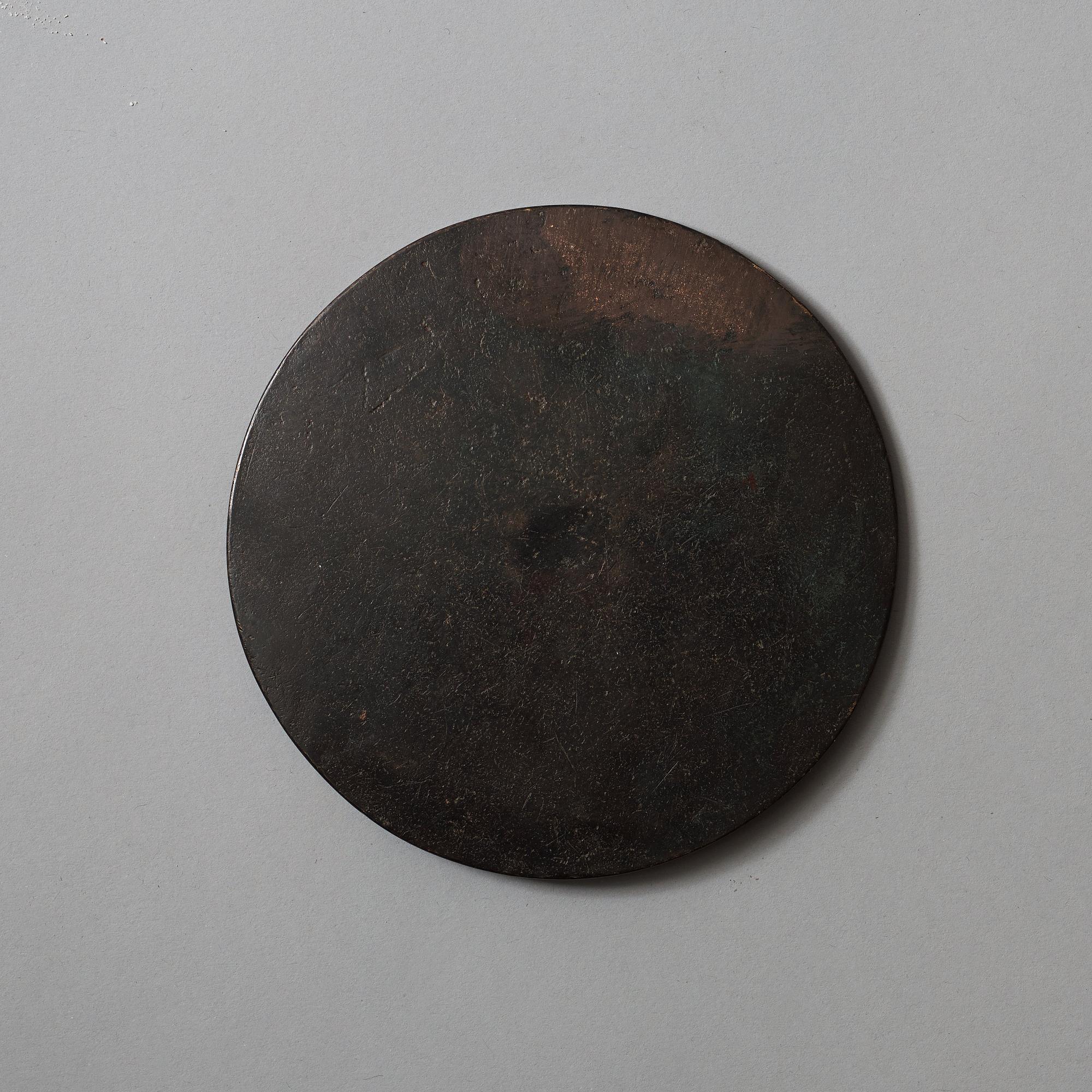 Two bronze mirrors, Han dynasty (206 BC -220 AD).