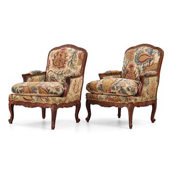 36. A pair of Louis XV 18th century armchairs.