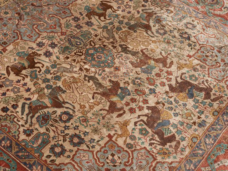 A RUG. A semi-antique silk figural souf (in relief), probably India. 208 x 128,5 cm (as well as two cm flat weave at.