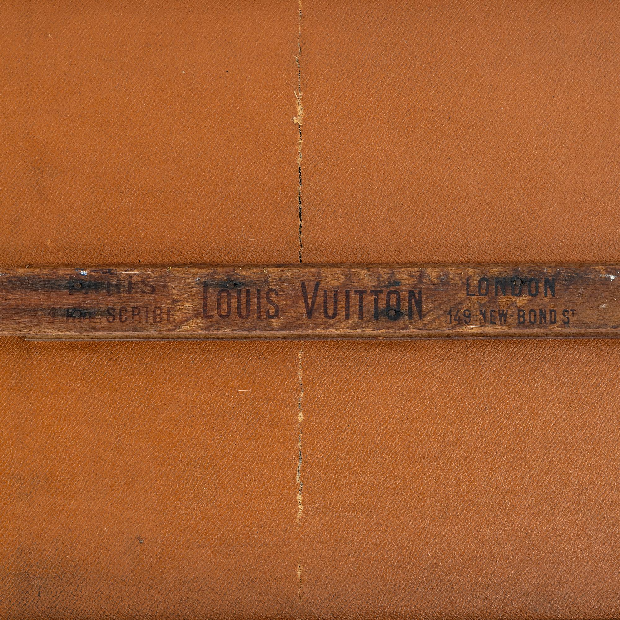 Louis Vuitton, orange Steem Trunk from the early 20th century.