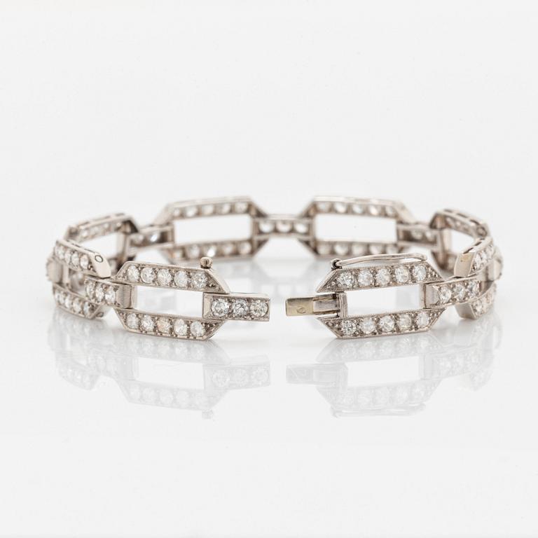 A platinum bracelet set with old-cut diamonds.