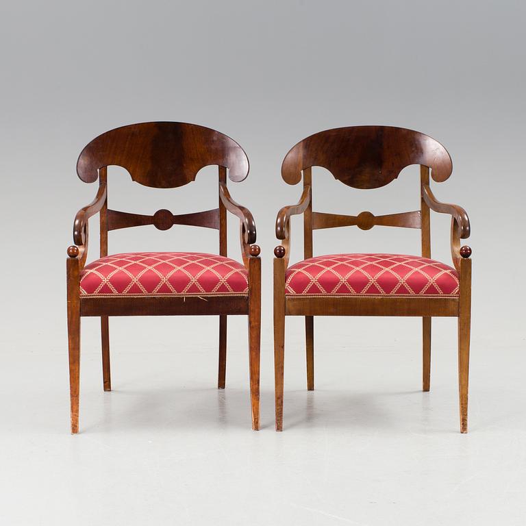 A pair of Karl Johan mahogany armchairs first half of the 19th century.