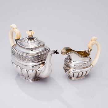 A SILVER COFFE POT AND CREAMER, Moscow 1828 and St:Petersburg 1836, total weight 750 g.