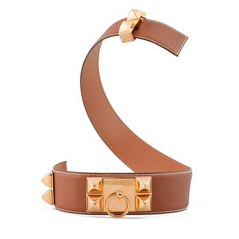 94. A Hermès brown leather belt.