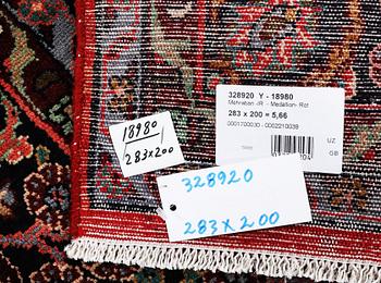 A Mehraban rug, c. 283 x 200 cm.