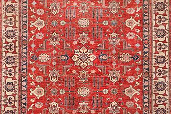 A Kazak carpet, c. 325 x 240 cm.