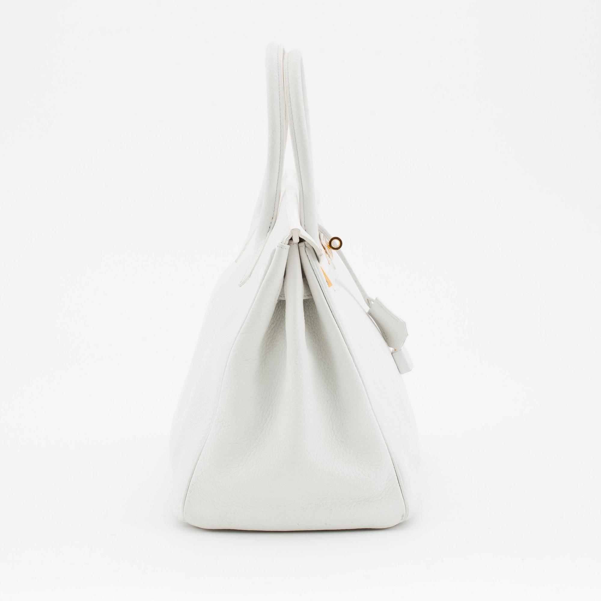 HERMÈS, a Tourillon clemence white handbag, "Birkin 35".