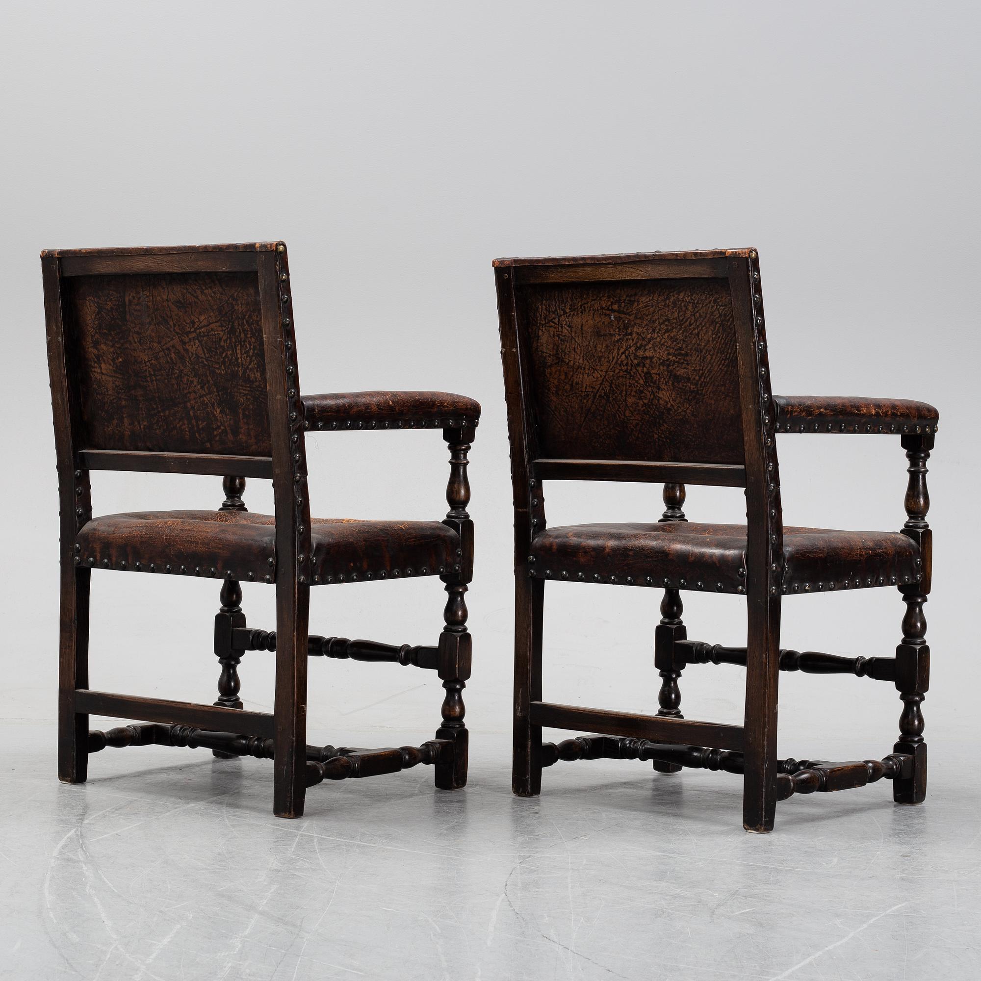 A pair of baroque style armchairs, first half of the 20th century.