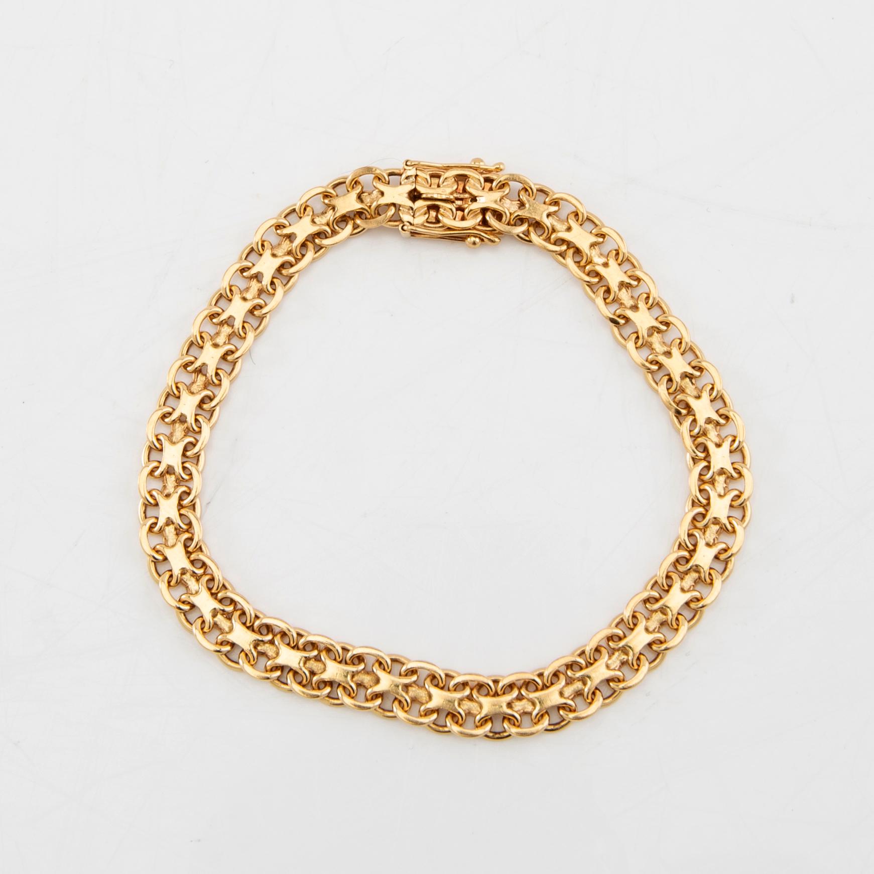 Bracelet X-link 18K gold.