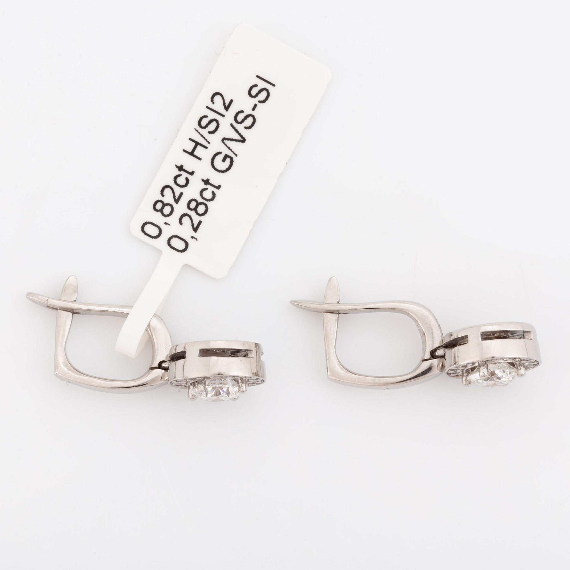 Brilliant-cut diamond earrings.