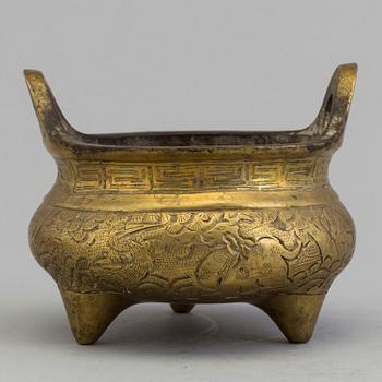 A Chinese early 20th century gilt-bronze censer, with Xuandes six character mark to the base.