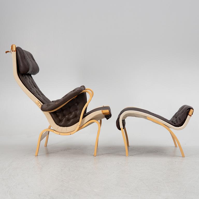 Bruno Mathsson, a 'Pernilla' armchair with ottoman, Dux.