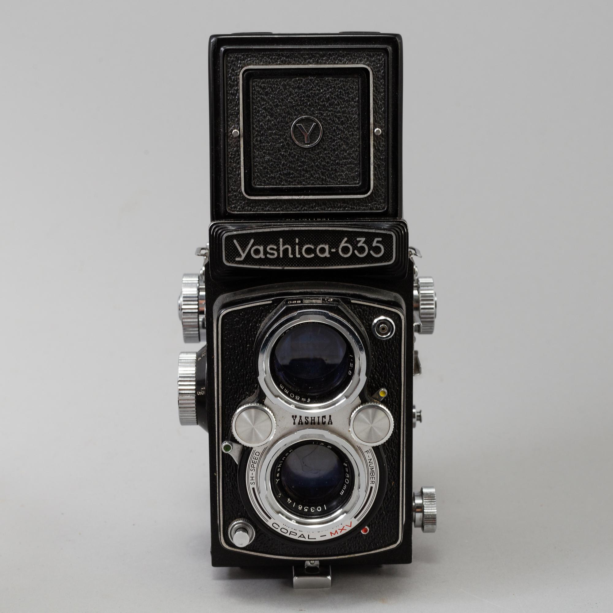 Two Twin Lens Reflex Cameras, a 1950s /60s Yashica 635 and a 1930s Rolleicord.