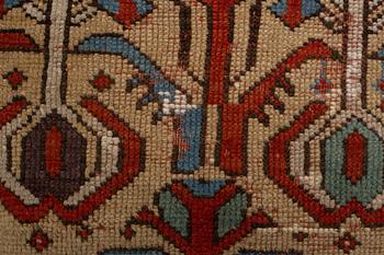 A rug, antique Anatolian/Caucasian, ca 148-149 x 104,5-110 cm (as well as 1-1,5 cm flat weave at one end).