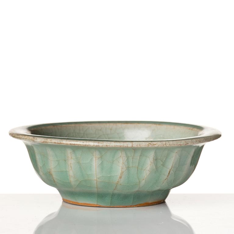 A celadon glazed double fish bowl, Yuan dynasty.