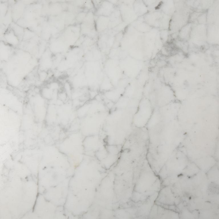 A 'Tulip' table by Eero Saarinen.