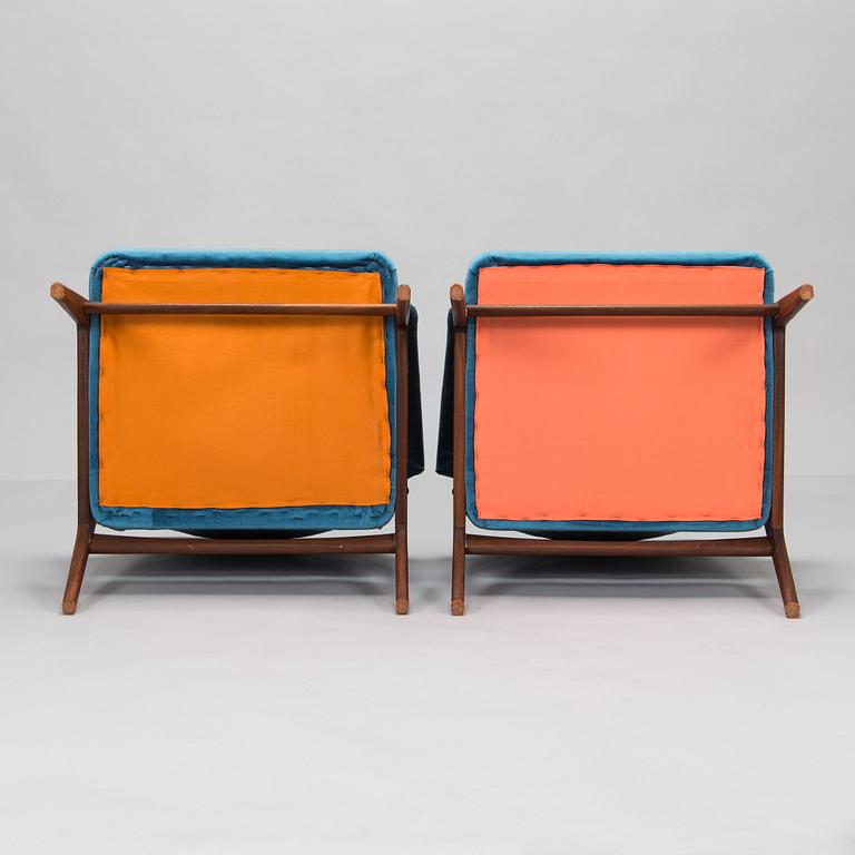 A pair of mid 20th century armchairs.