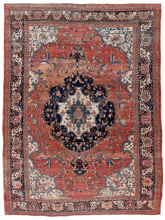 An Antique Sarouk carpet, West Persia, c. 353 x 260 cm.
