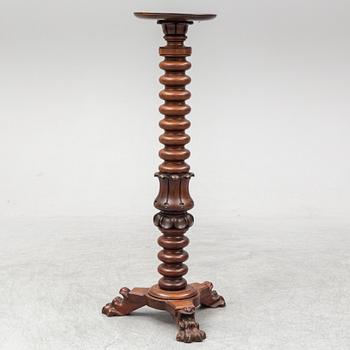 A mahogany pedestal, probably England, first half of the 20th century.